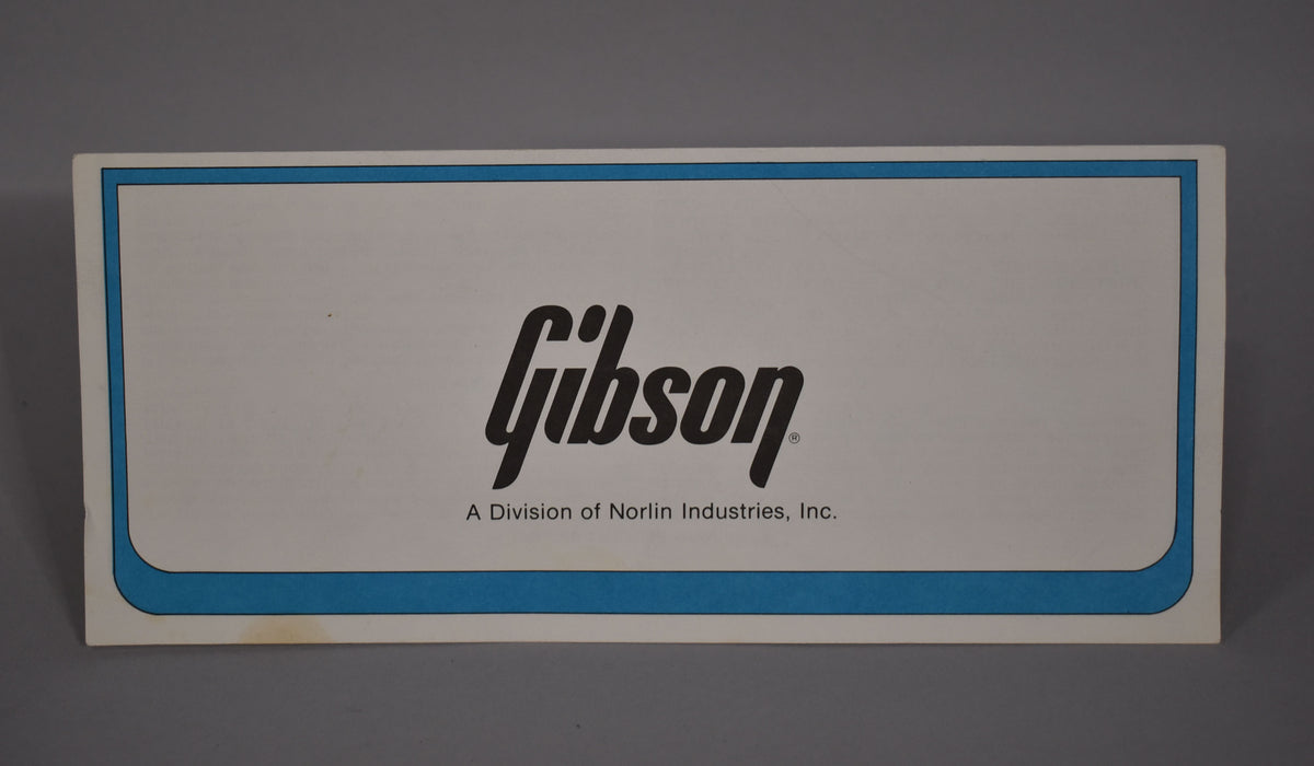 White rectangular paper with a blue border, featuring the black Gibson logo and "A Division of Norlin Industries, Inc." text.
