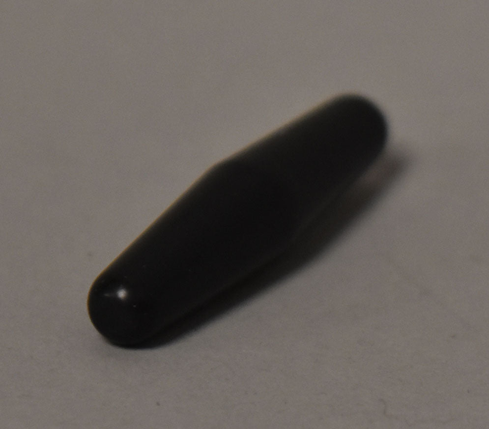 A black, smooth, cylindrical tremolo arm tip with a rounded end, viewed from above at a slight angle.