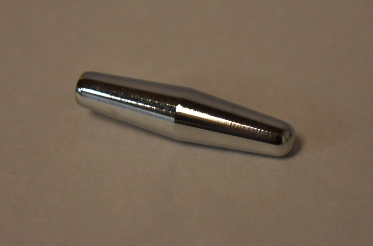 A chrome tremolo arm tip, viewed from above and slightly to the side, showing its smooth, rounded, bullet-like shape.