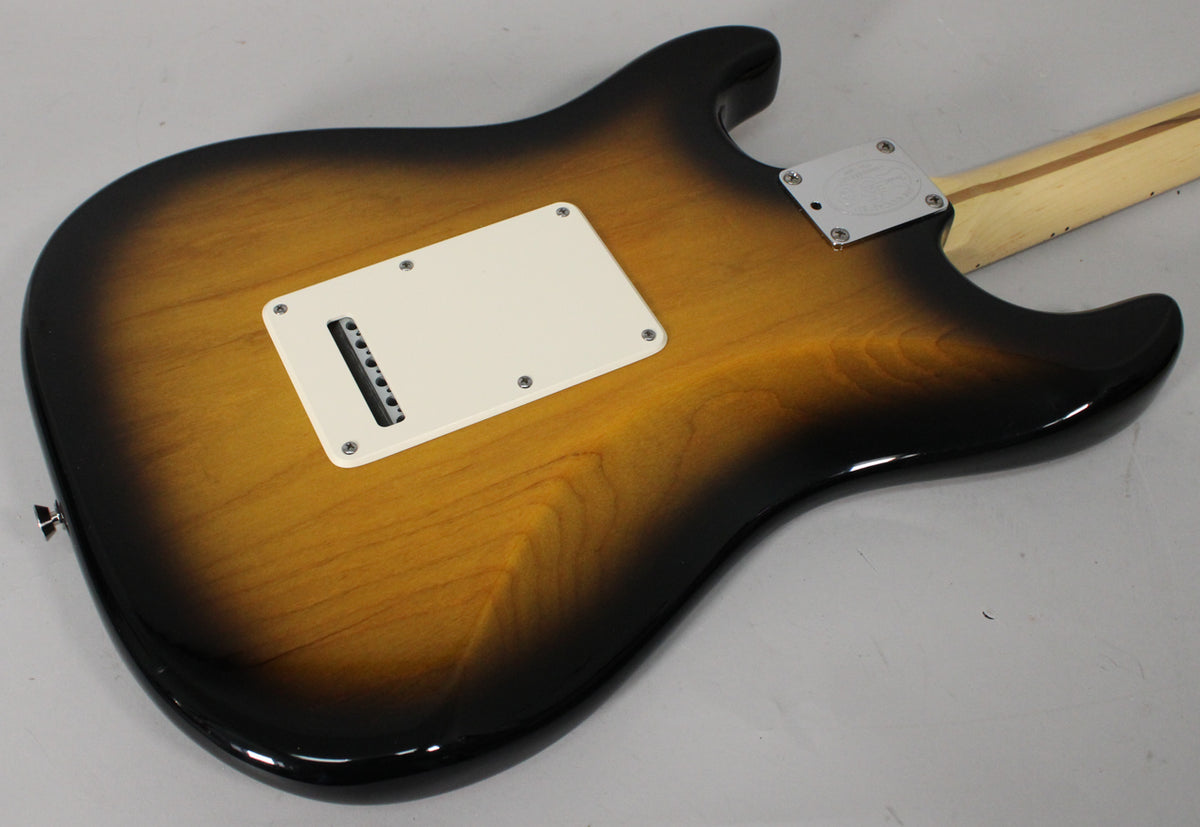 The guitar's back shows a 2-color sunburst finish, a white tremolo cover, and a chrome neck plate with a visible logo.