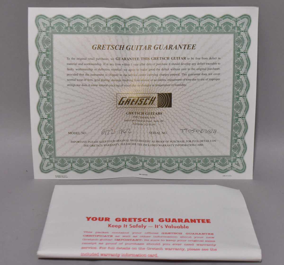 Gretsch Guitar Guarantee certificate with model and serial numbers, and a red-lettered "Your Gretsch Guarantee" envelope.