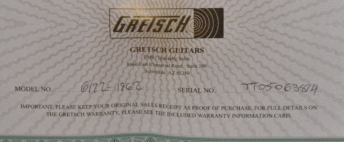 Close-up of a Gretsch warranty card with "6122-1962" handwritten for model number and "JT05063814" for serial number.
