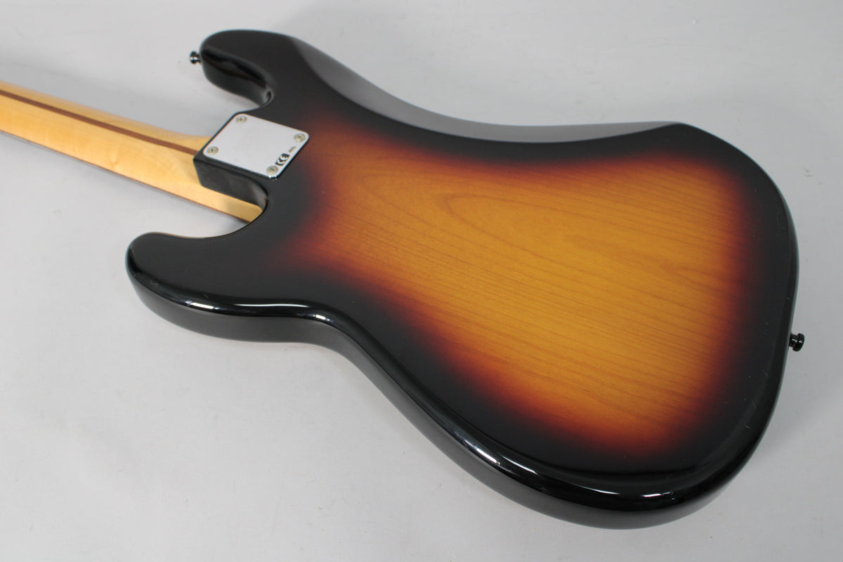 Rear view of a sunburst Precision Bass body with a maple neck, showing the neck plate and strap button, no visible wear.