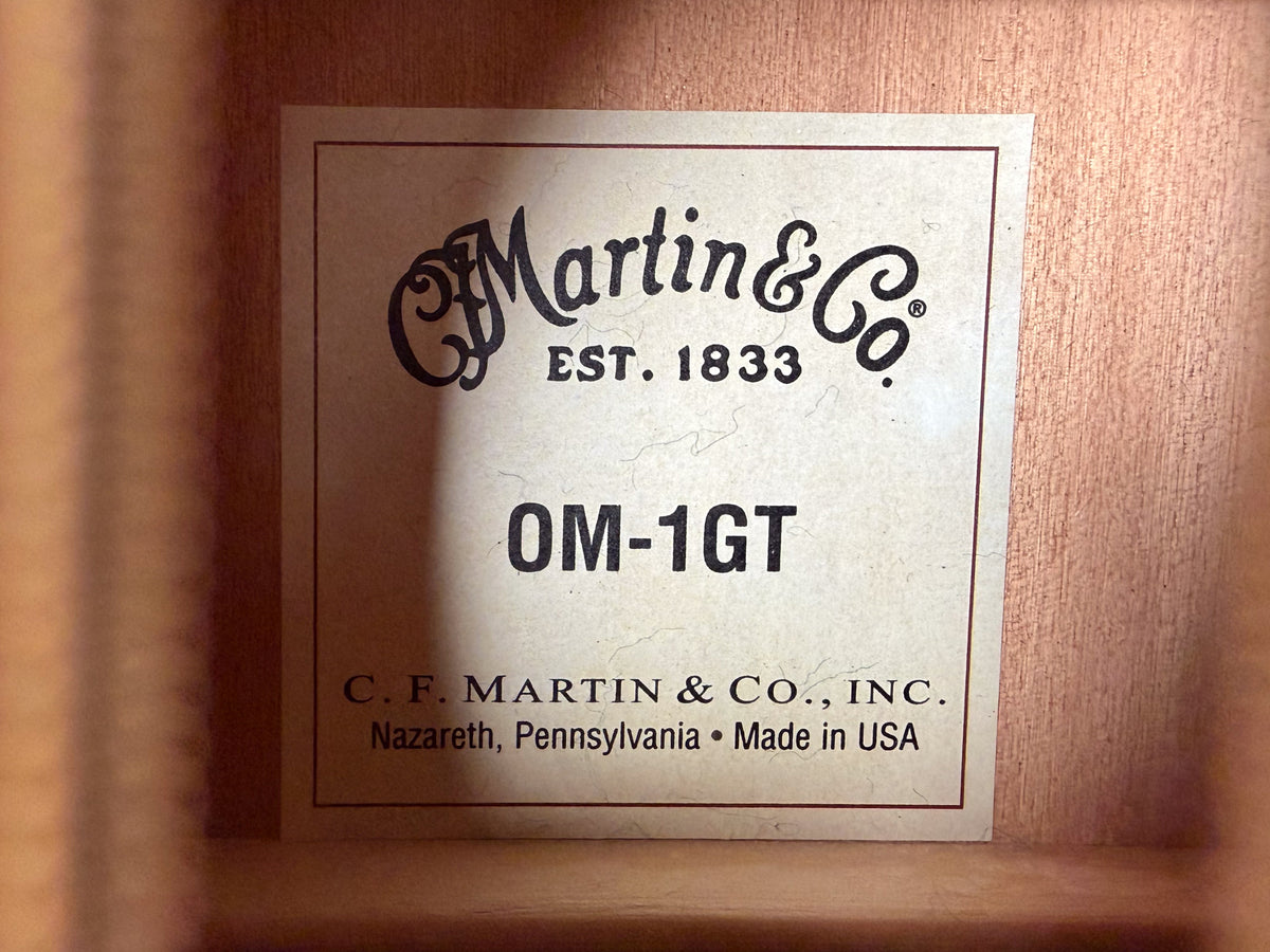 Close-up of the guitar's interior label, showing the model name and "Made in USA" on a light, textured paper with a dark border.