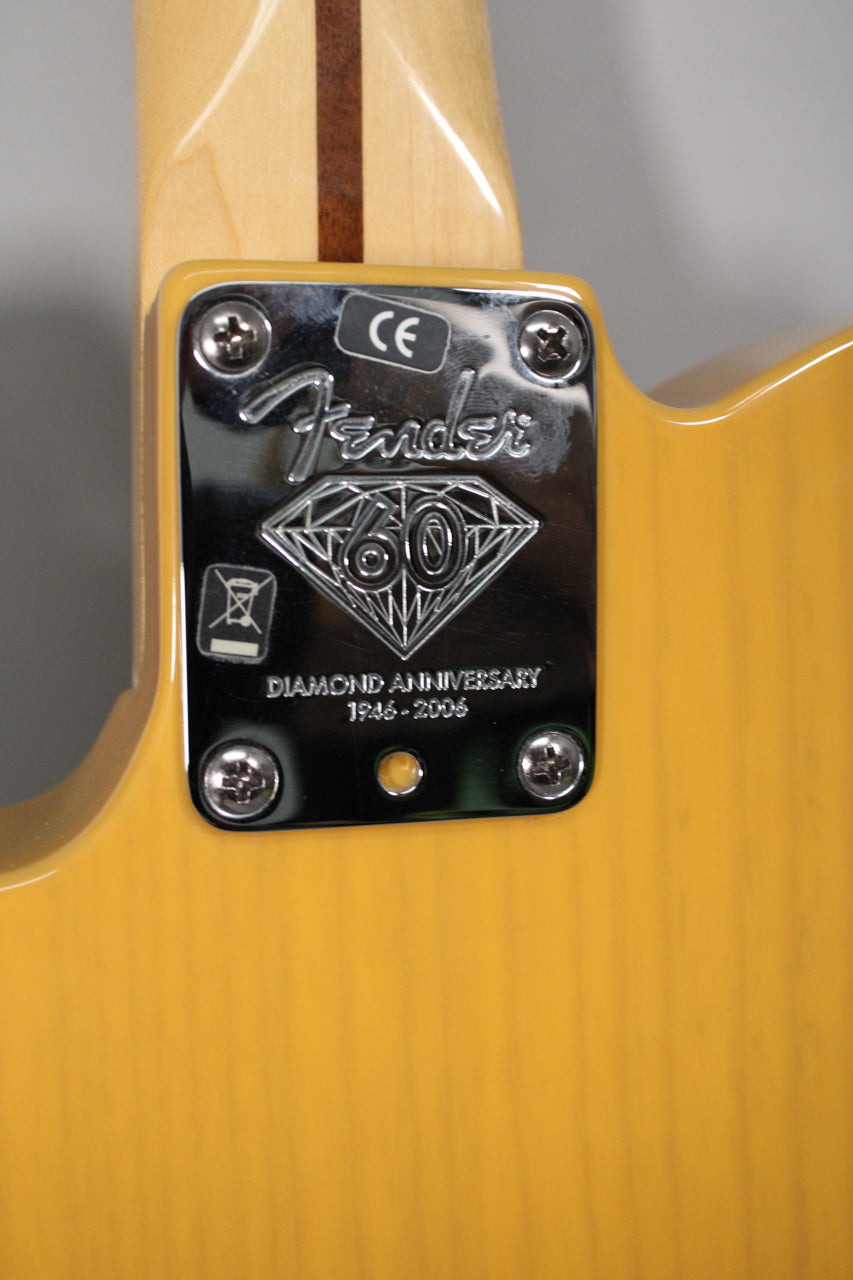 Close-up of the guitar's butterscotch blonde body and neck joint, showing a chrome neck plate with a "60 Diamond Anniversary" engraving.