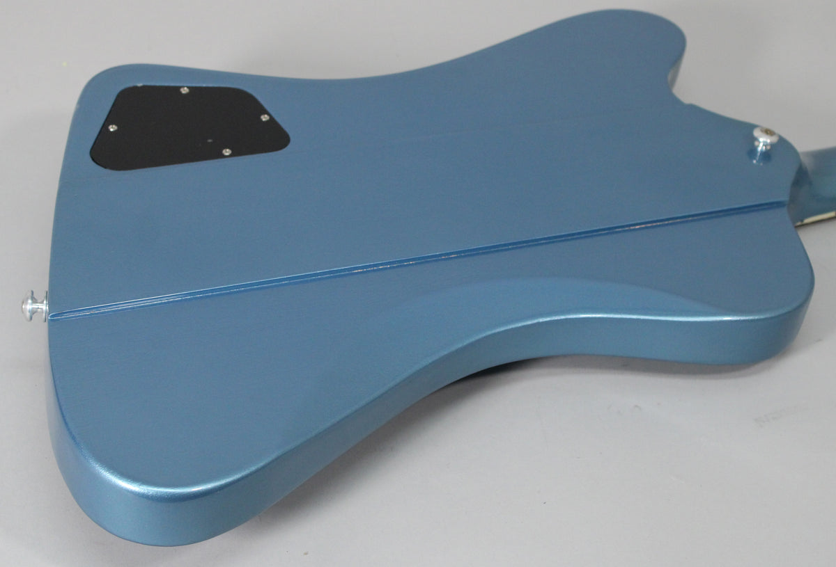 The back of the Pelham Blue guitar body, showing the control cavity cover, neck-through construction, and two strap buttons.