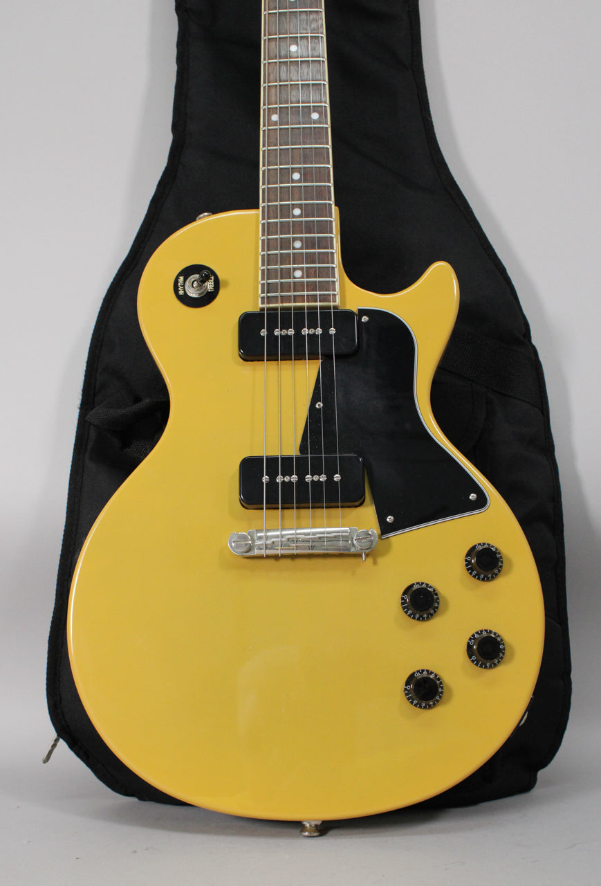 Full view of a TV Yellow Les Paul Special, with two P90 pickups, a black pickguard, and four black control knobs.