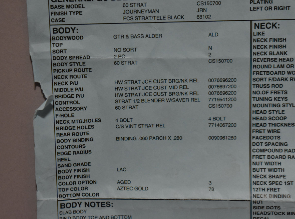 A close-up of a white paper spec sheet, with sections for "BODY" and "NECK" details visible.