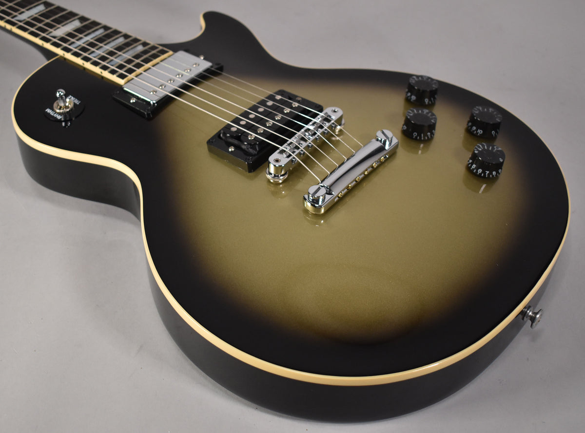 The guitar's body, in antique silverburst, is angled from the neck to the lower bout, showing chrome hardware and black control knobs.