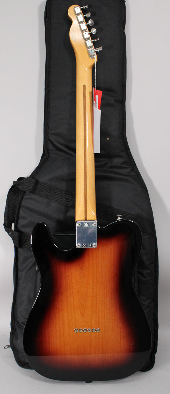 The guitar's back, neck, and headstock are visible, showing a 2-color sunburst finish, chrome tuners, and string-through-body ferrules.