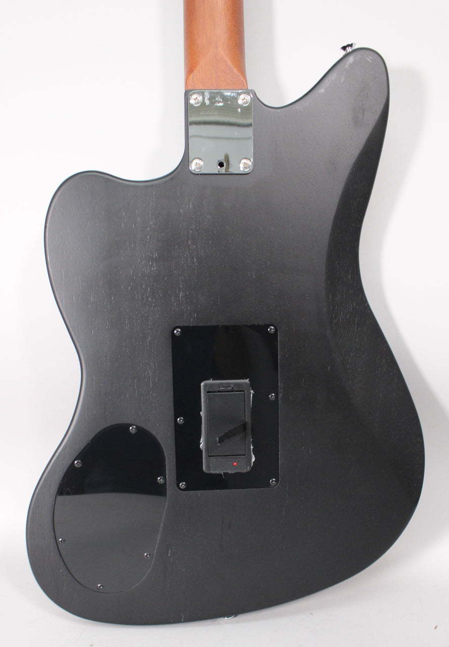 The guitar's black matte back shows a battery compartment with a red light, a control plate, and a chrome neck plate.