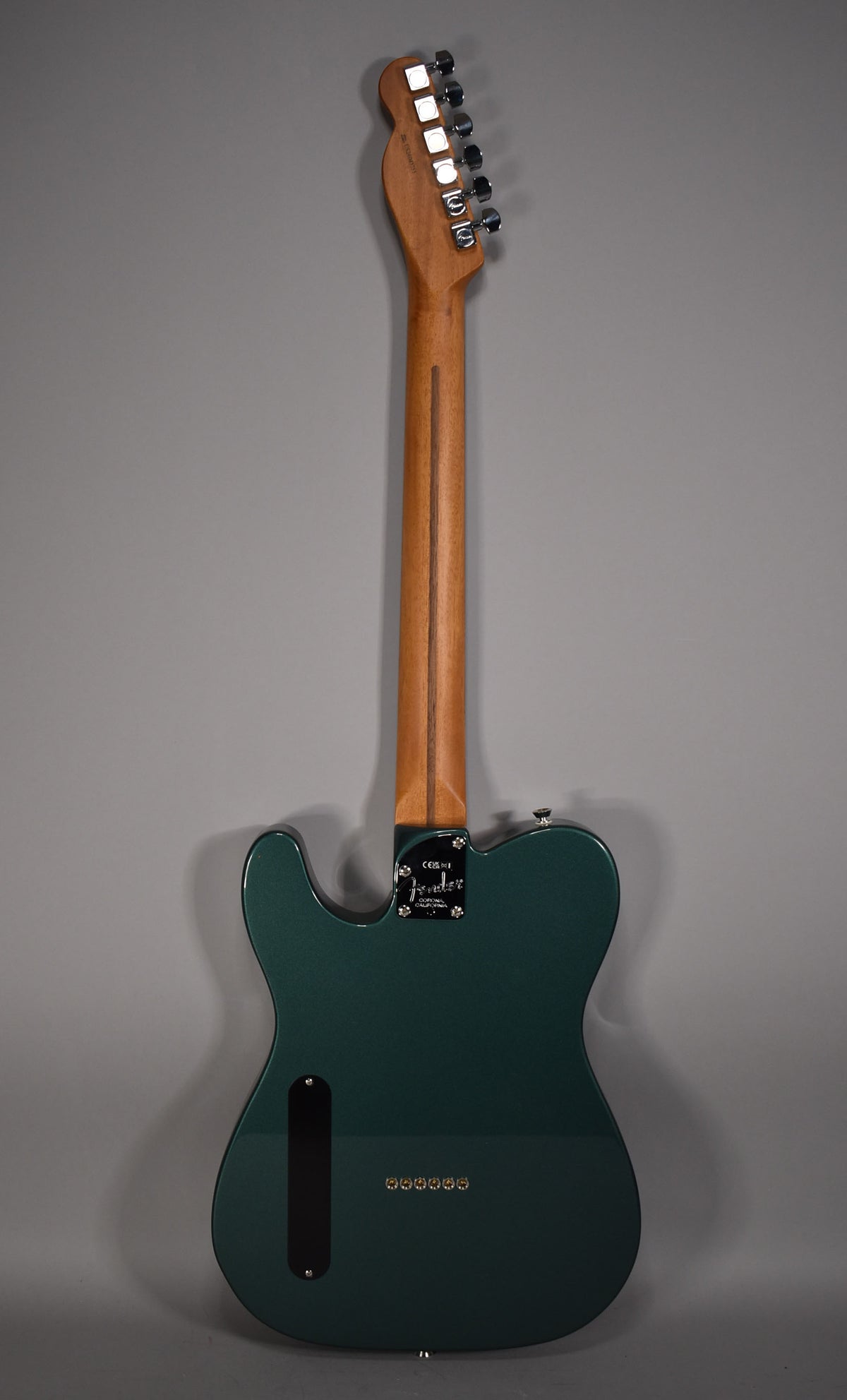 Full rear view of a Sherwood Green Telecaster with a satin finish, a light wood neck, and six string-through-body ferrules.