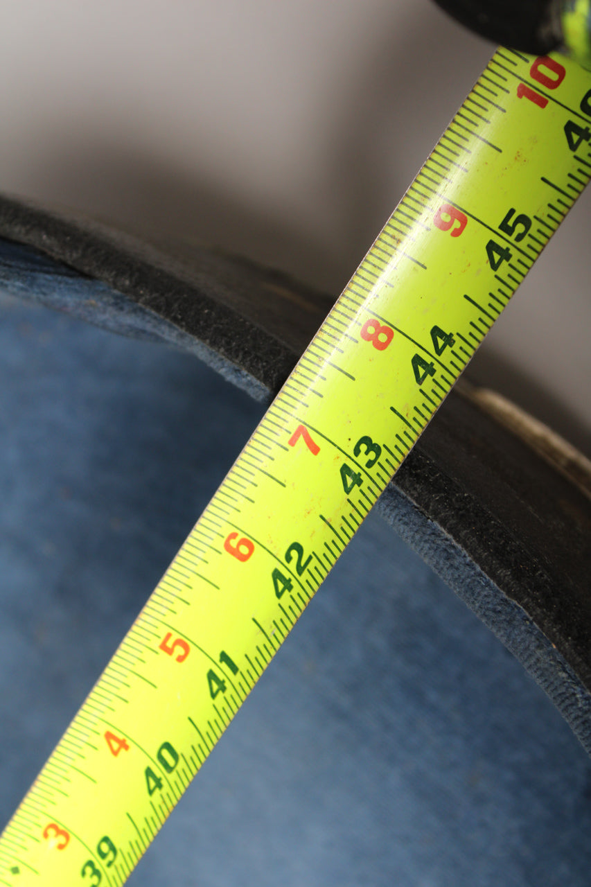 A yellow tape measure shows the case's black edge and blue side, measuring from 39 to 46 inches.