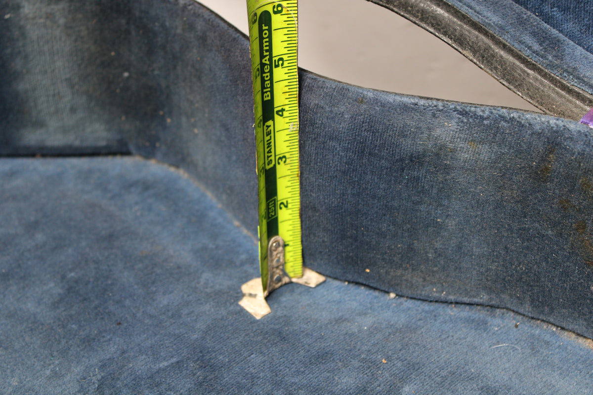 Close-up of the case's worn blue velvet interior, with a tape measure showing a depth of 2.5 inches.