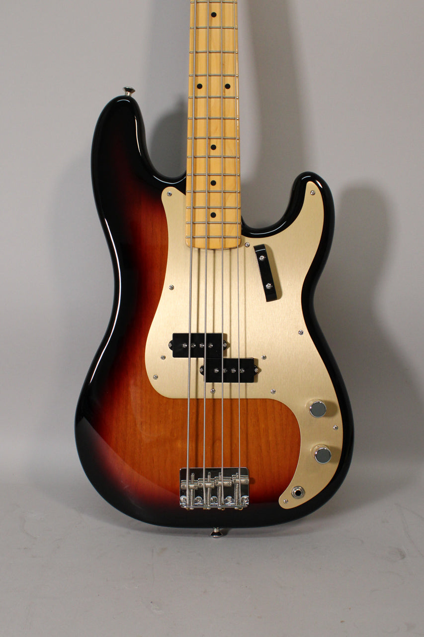 Sunburst P-style bass, full front view, with a gold anodized pickguard, split pickup, and maple fretboard.