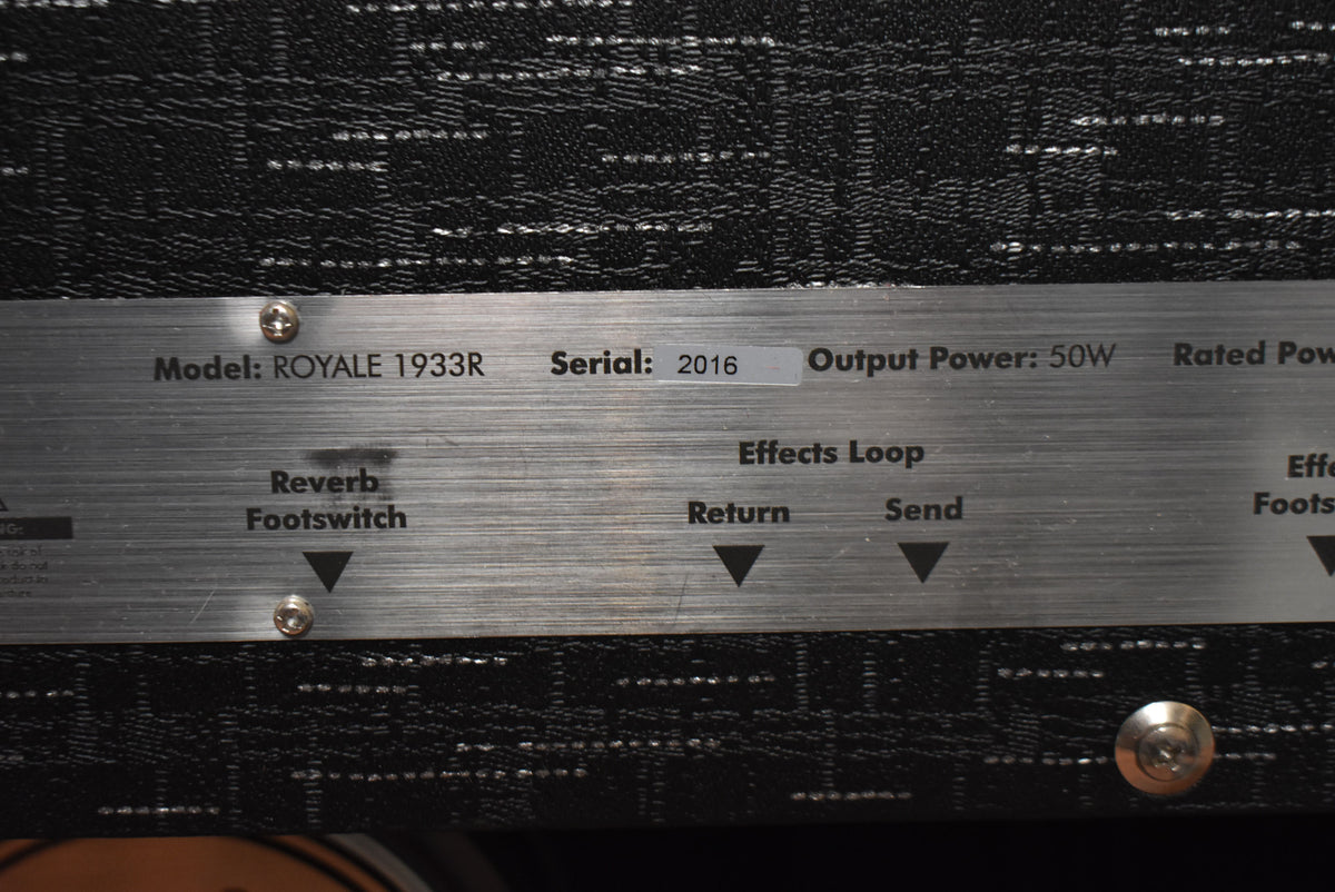 Close-up of the brushed metal rear panel, showing the serial number, "Output Power: 50W", and "Reverb Footswitch" and "Effects Loop" jacks.