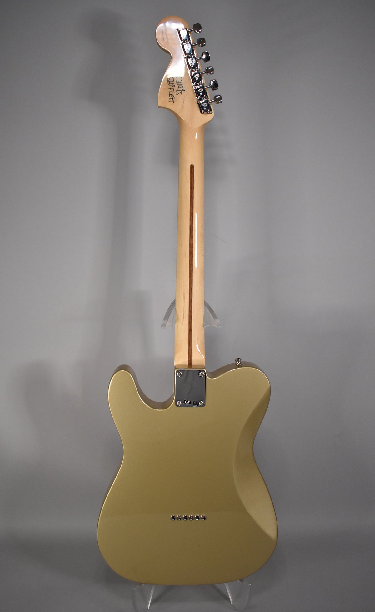 The guitar's back, neck, and headstock are shown, with a Shoreline Gold body and a light wood neck with a dark stripe.