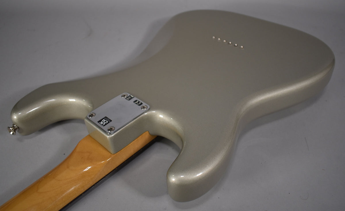 The back of the Inca Silver Stratocaster body, showing the neck plate, strap button, and six string-through-body ferrules.