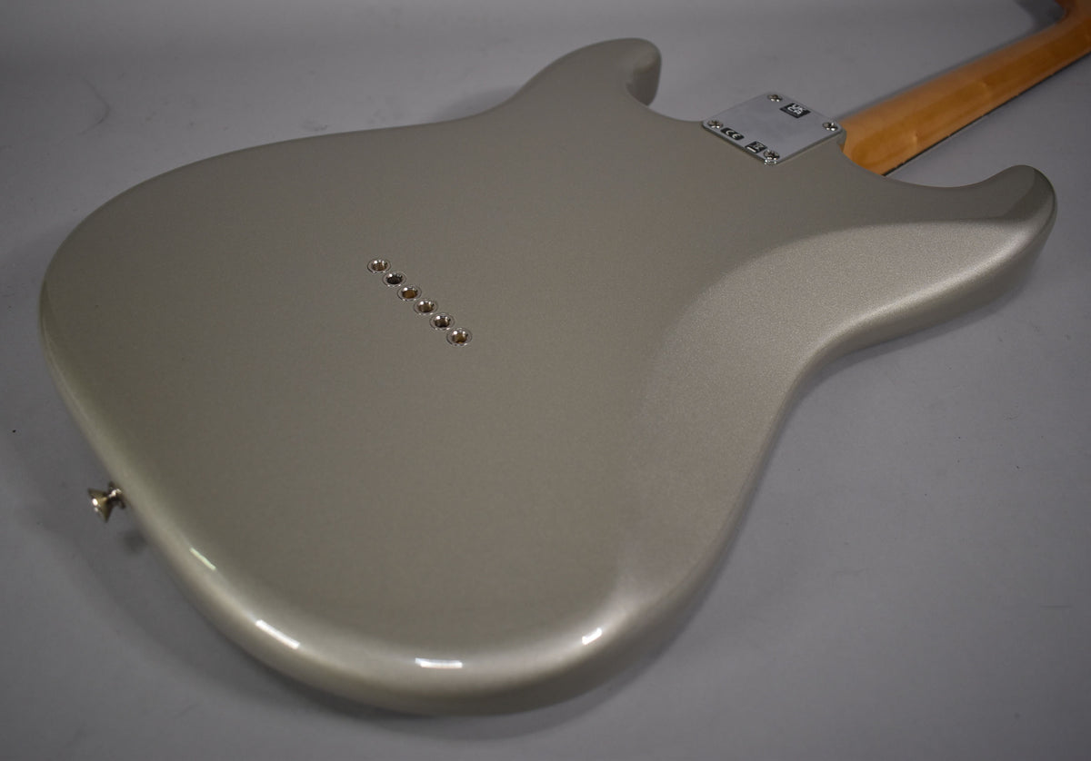The back of the Inca Silver Stratocaster body, showing the six string-through-body ferrules and a chrome neck plate.