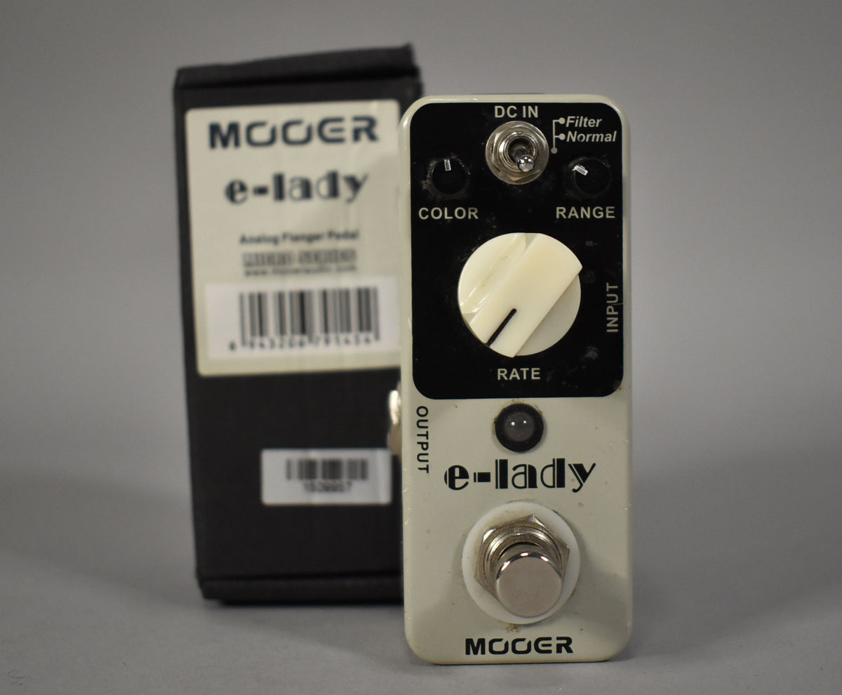 A cream-colored pedal with a large white "Rate" knob, two smaller black knobs, a toggle switch, and a footswitch.