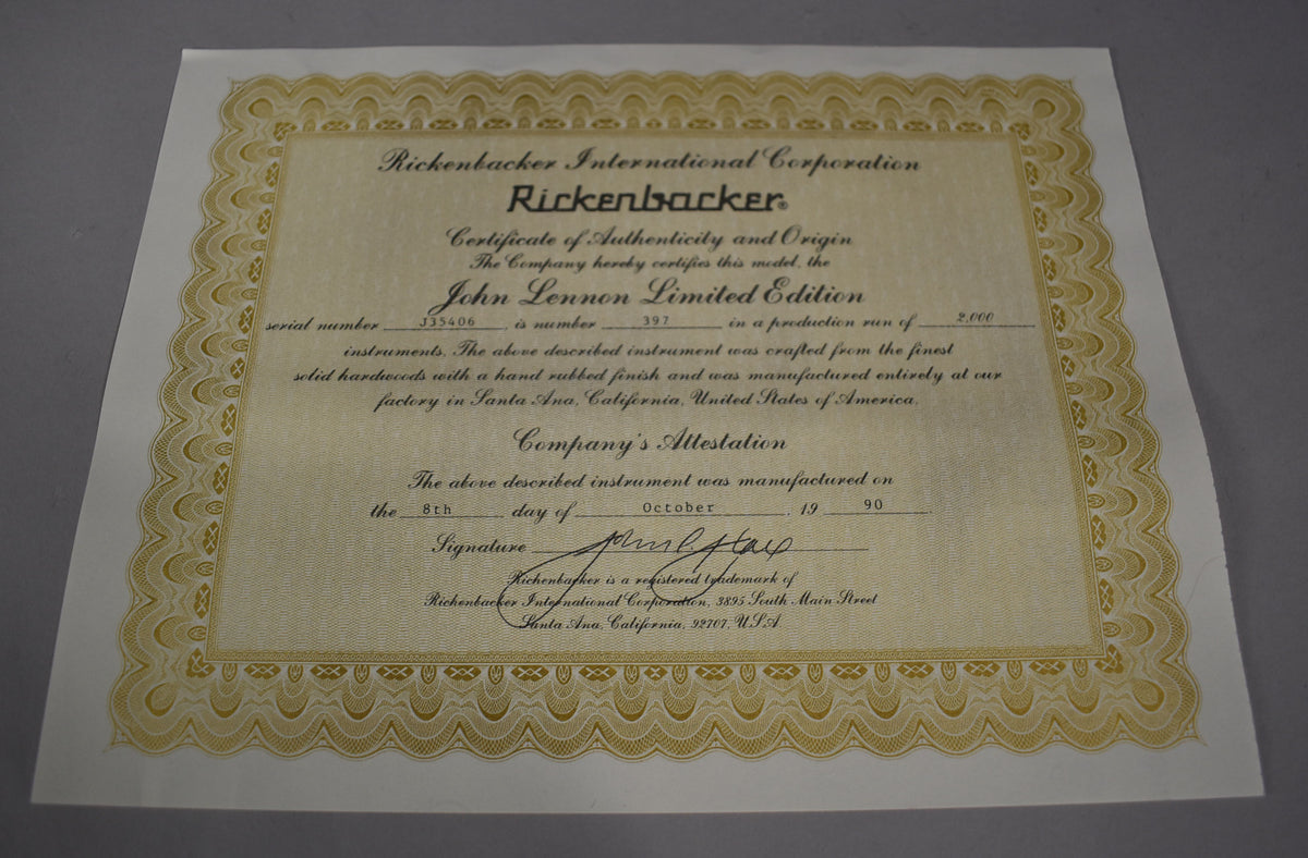 A Rickenbacker Certificate of Authenticity for a John Lennon Limited Edition, dated October 8, 1990, with serial number 335406.