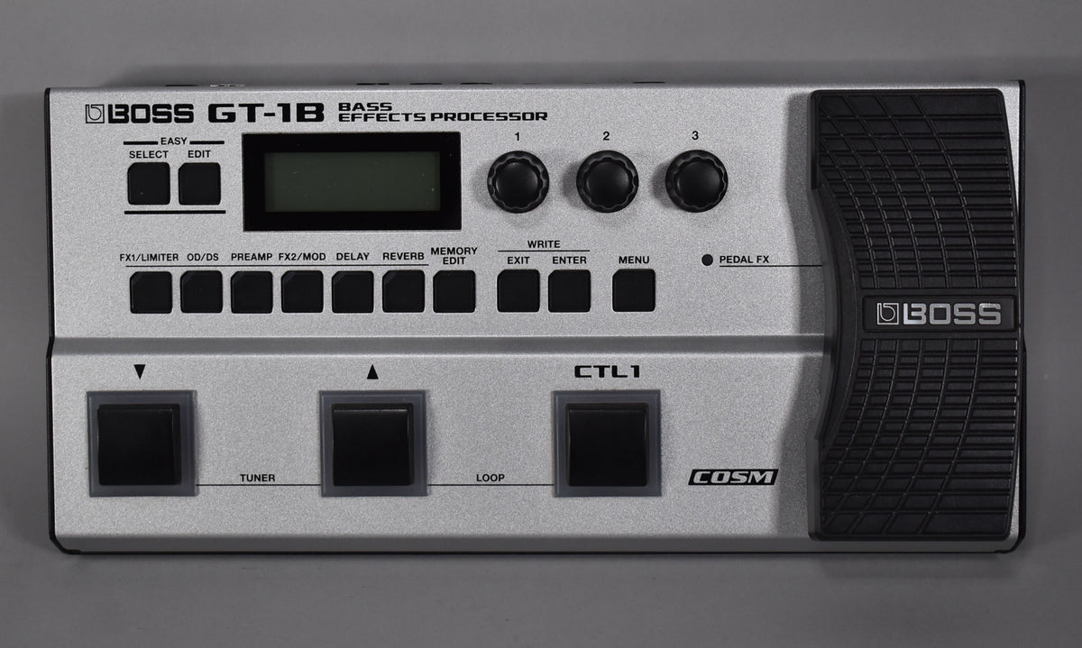 A silver multi-effects pedal with a black expression pedal on the right, a screen, three knobs, and multiple black footswitches.