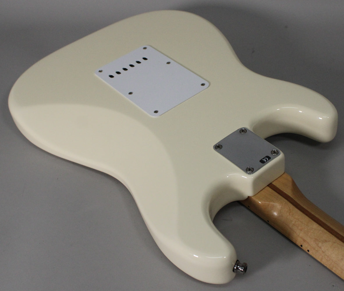 Rear view of an Olympic White Stratocaster body, showing the tremolo cavity cover, neck plate, and strap button.