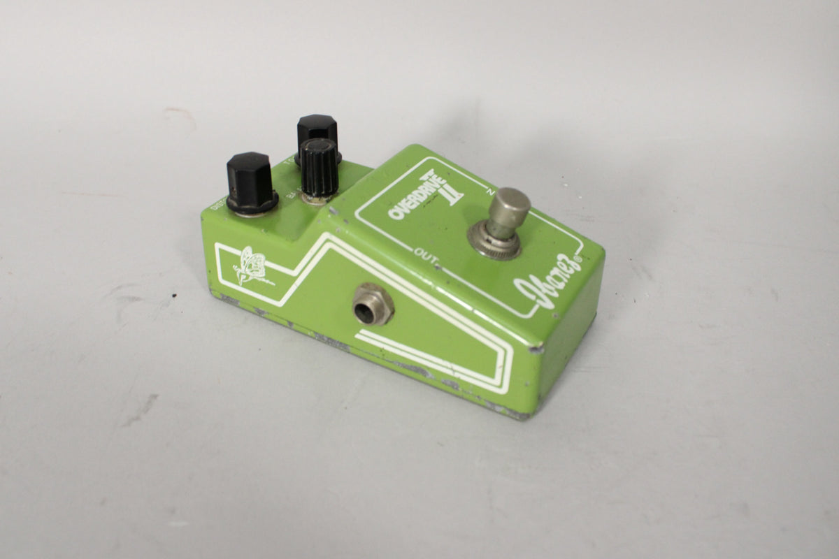 A green Ibanez Overdrive II OD-855 guitar pedal with three black knobs, a silver footswitch, and an "OUT" jack.