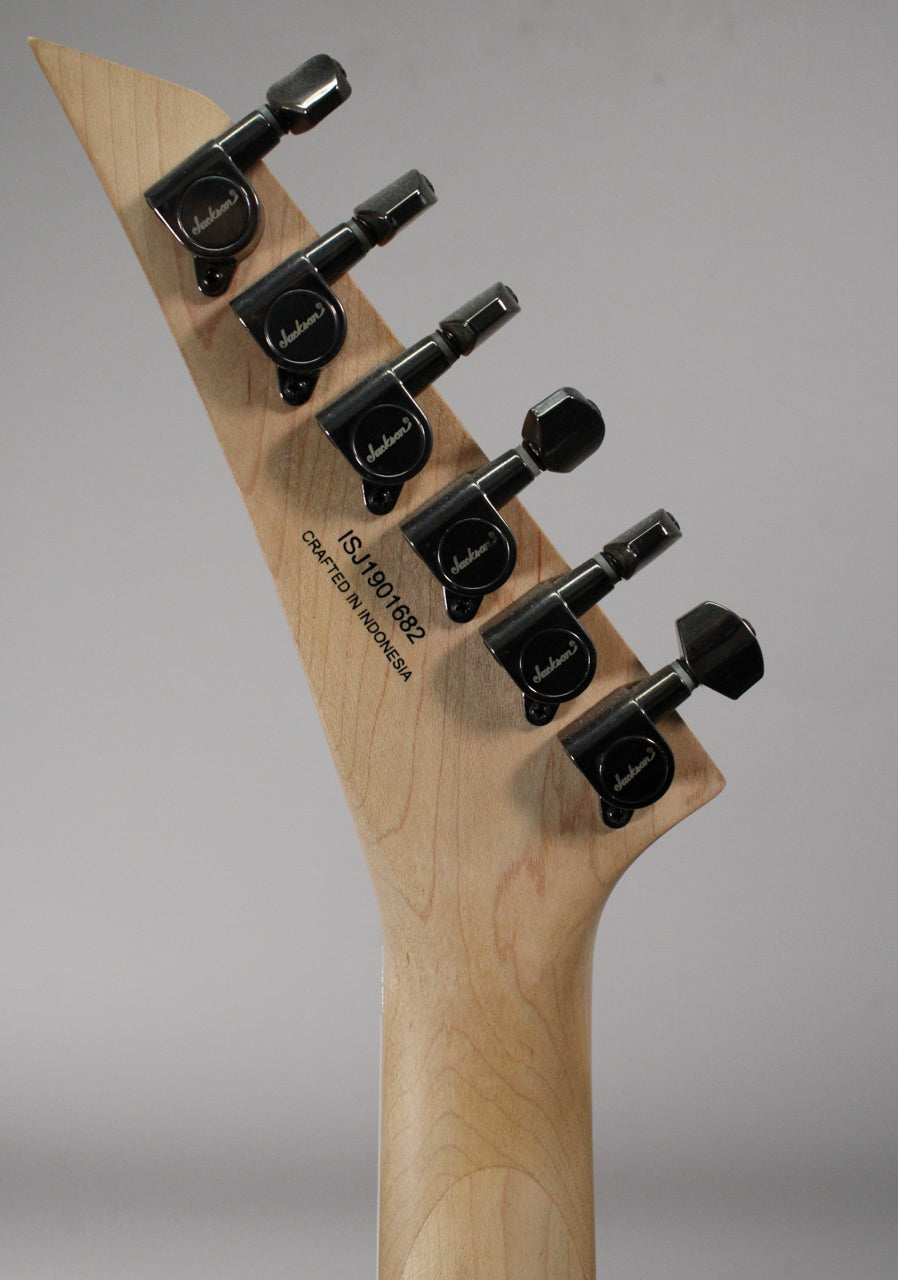 The back of the guitar's natural wood headstock and neck, showing six black tuning machines and "CRAFTED IN INDONESIA" text.