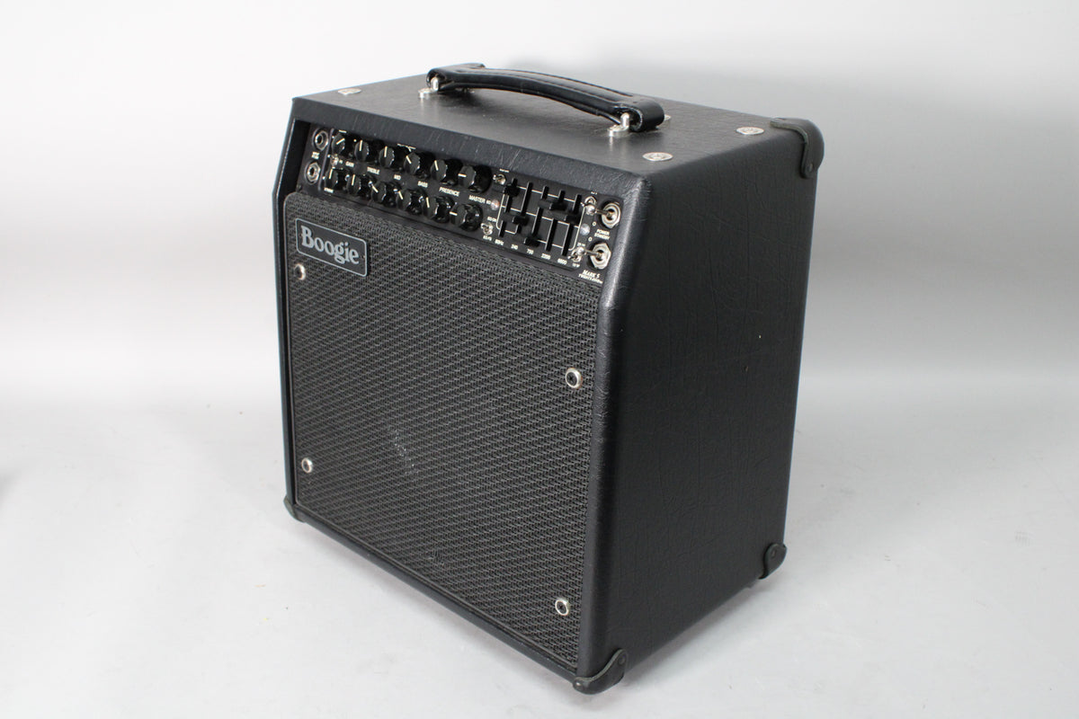 Black combo amp, angled to show the front and right side, with a black speaker grille and a control panel featuring many knobs and switches.