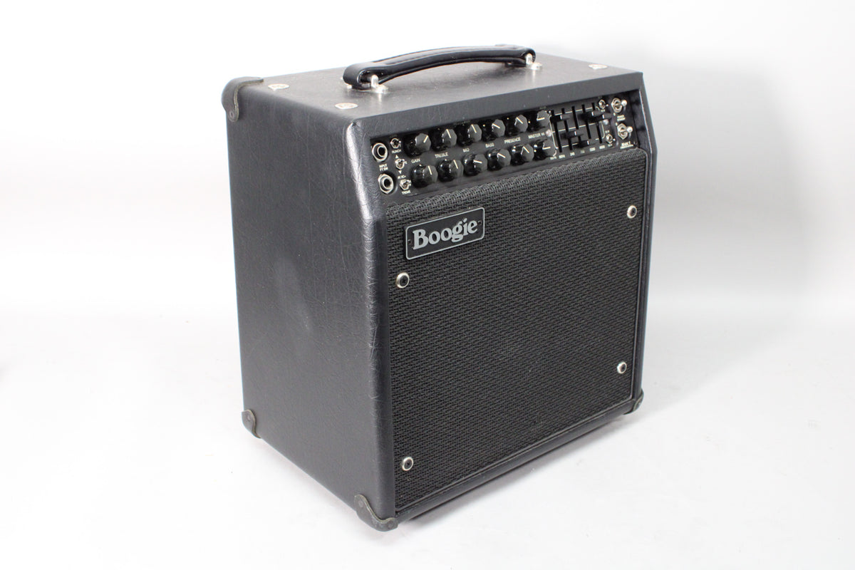 A dark gray combo amp, angled to show the front and left side, with a black control panel and speaker grille.