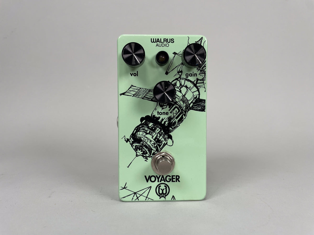 Light green effect pedal with three black knurled knobs, a chrome footswitch, and a black line art drawing of a satellite.