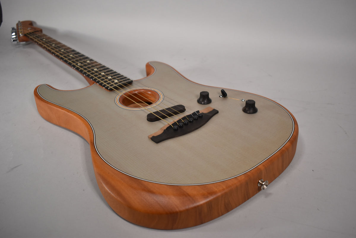 Acoustasonic Stratocaster with a light blue top, natural wood sides, and a dark fretboard, angled from the headstock to the lower bout.