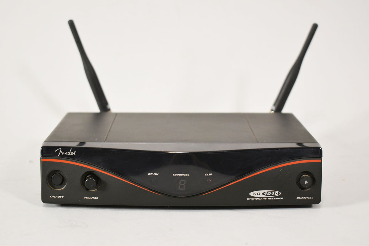 Black wireless receiver with two antennas, an orange-striped front panel, and a central digital display showing "8".